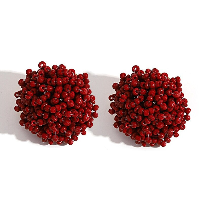 Skanto | Lys og morsom håndlaget multicolor perle pompom stud øredobber