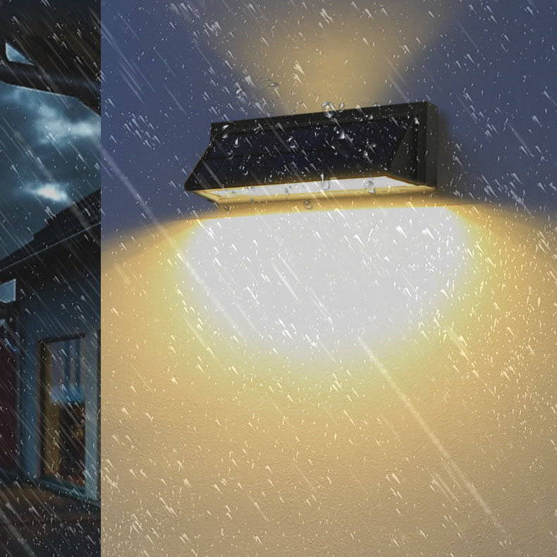 Vanntett, rektangulær LED-vegglampe for utendørs bruk med solenergi, ideell for terrasse og hage.
