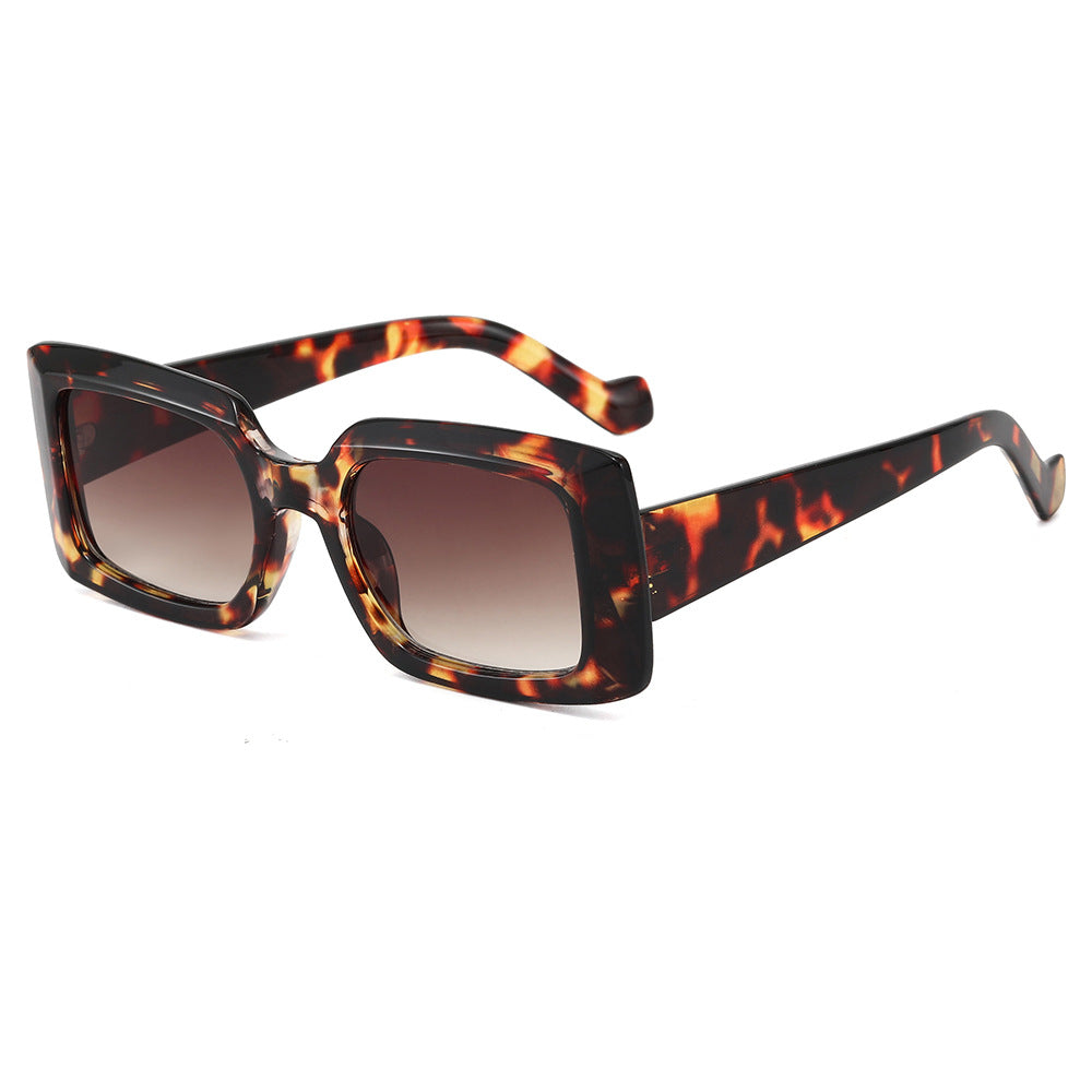 Dame moteristisk kvadratisk solbrille med gjennomsiktig design Skanto