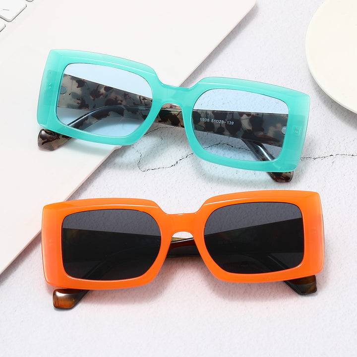 Dame moteristisk kvadratisk solbrille med gjennomsiktig design Skanto
