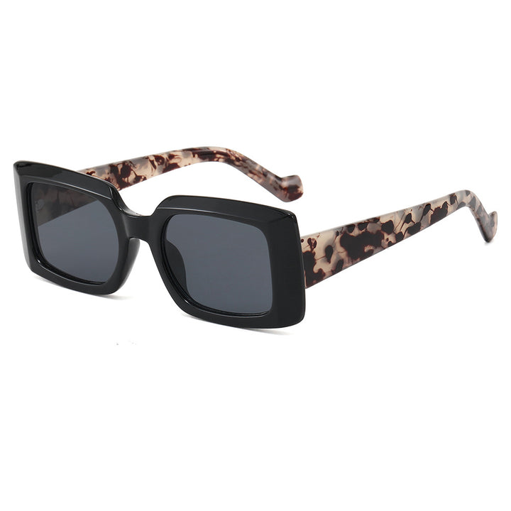 Dame moteristisk kvadratisk solbrille med gjennomsiktig design Skanto