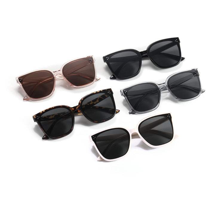 Dame moteriktig solbrille med gjennomsiktig aksent Skanto