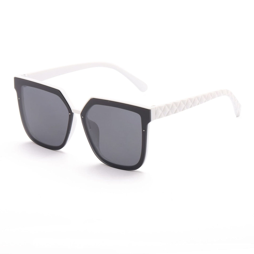 Dame modische solbrille med innovativ polygonal design Skanto