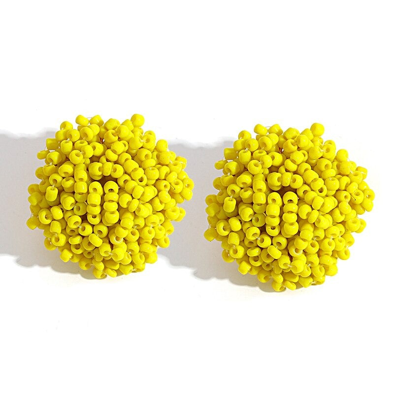 Skanto | Lys og morsom håndlaget multicolor perle pompom stud øredobber