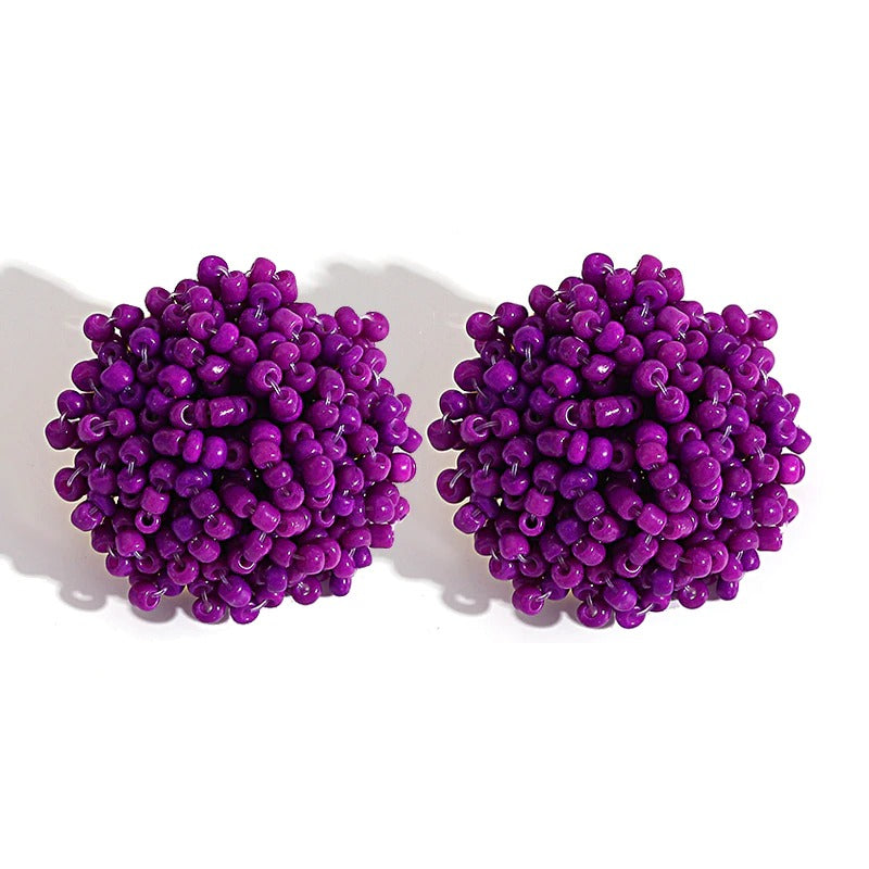 Skanto | Lys og morsom håndlaget multicolor perle pompom stud øredobber