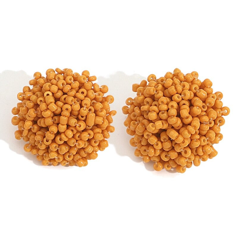 Skanto | Lys og morsom håndlaget multicolor perle pompom stud øredobber