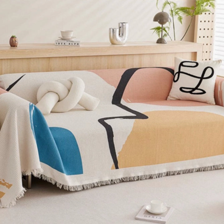Skanto | Lumiere Abstract Tasseled Sofa Cover