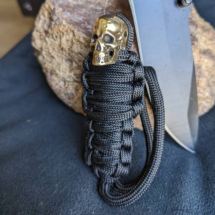 Skanto | Paracord nøkkelring mumie messing hodeskalle