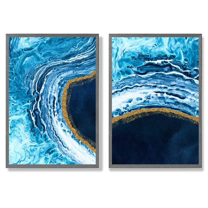 Abstrakt havmotiv i blått og gull, innrammet sett med 2 kunsttrykk med rammer