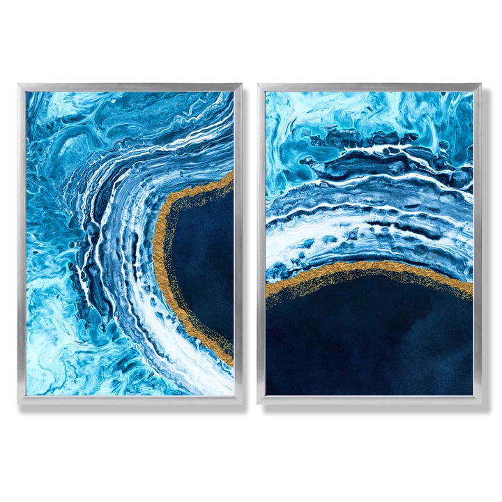 Abstrakt havmotiv i blått og gull, innrammet sett med 2 kunsttrykk med rammer