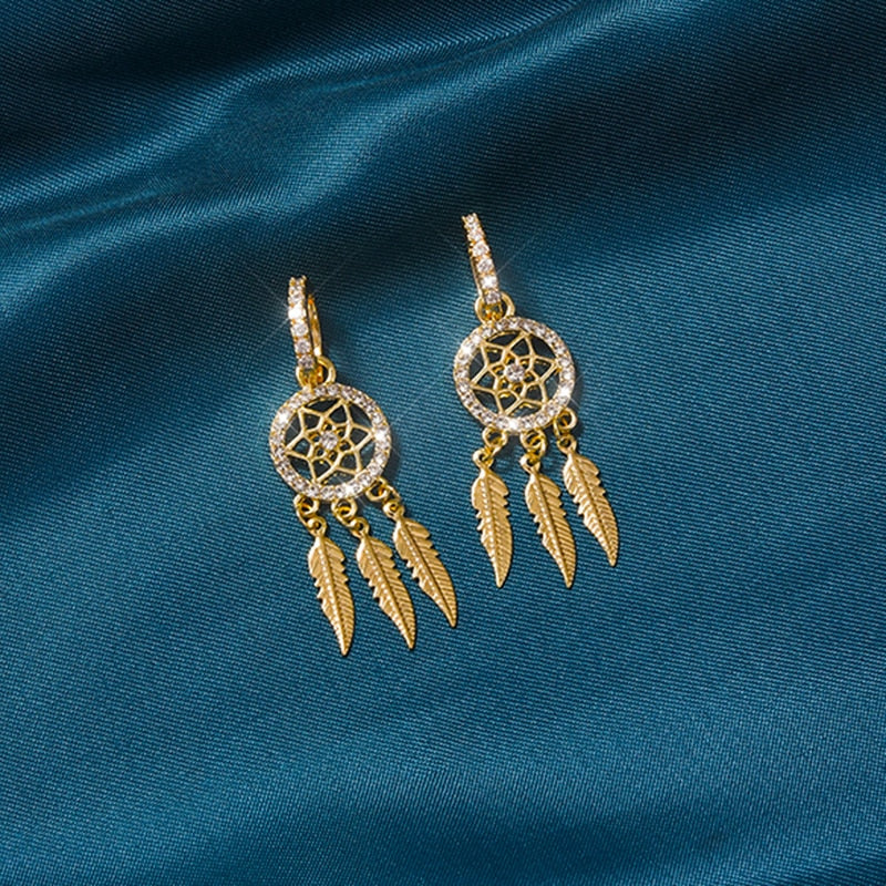 Skanto | Evani️ | Elegant raffinering med 14-karats gulløredobler