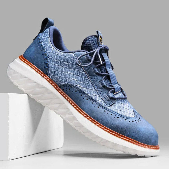 Vevde skinnsneakers med brogue-detaljer og kontrastsåle