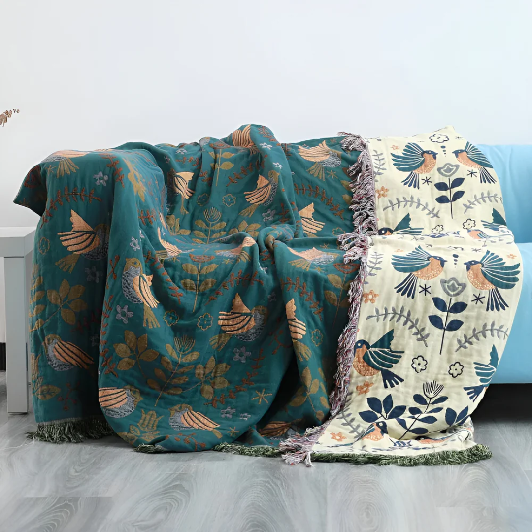 Skanto | Brodert bomullspledd med fugler og blomster