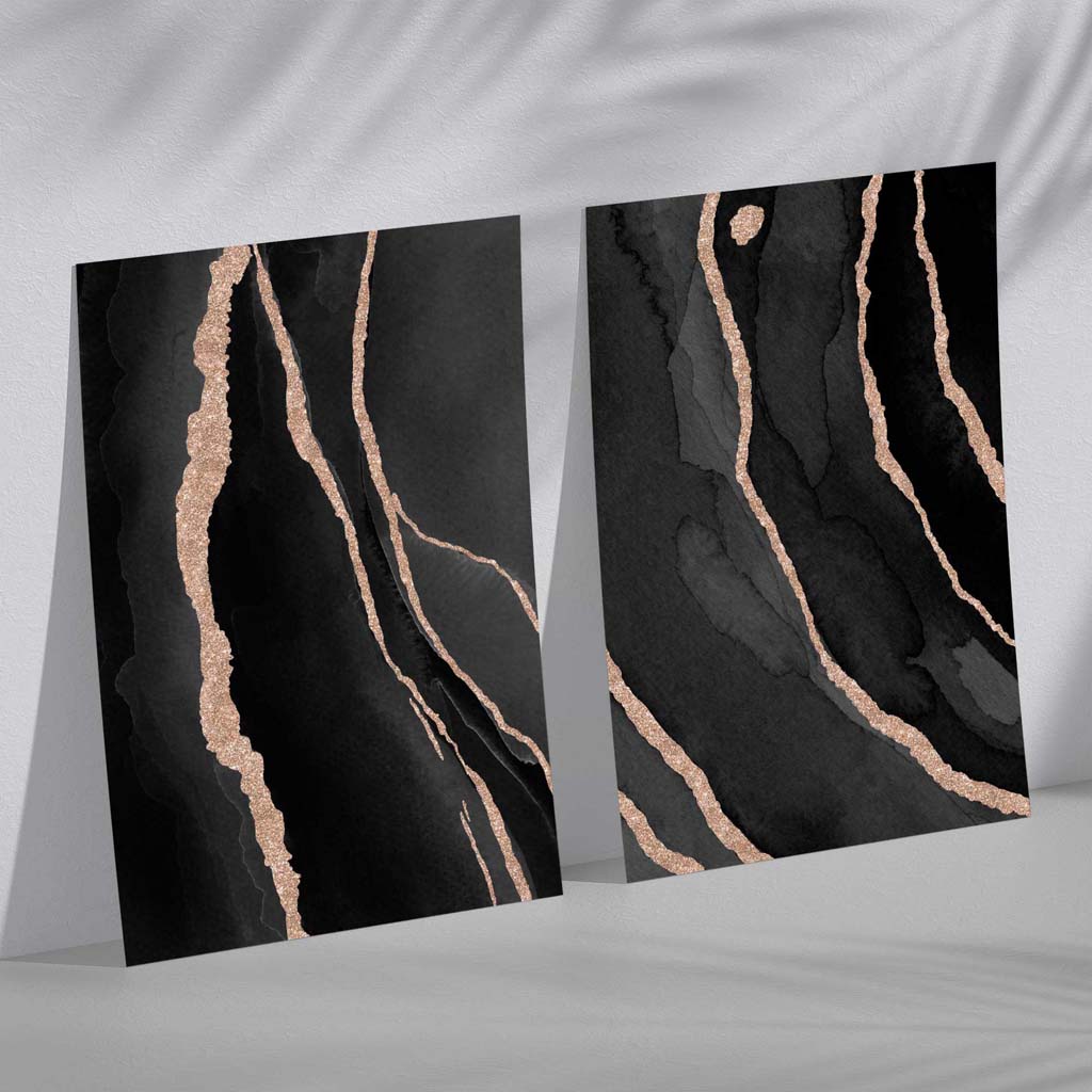 Abstrakt sett med 2 kunsttrykk i svart og gull