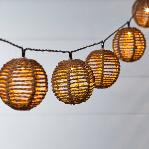 SolarGlow – Rattan Fe lys streng med magisk belysning Skanto