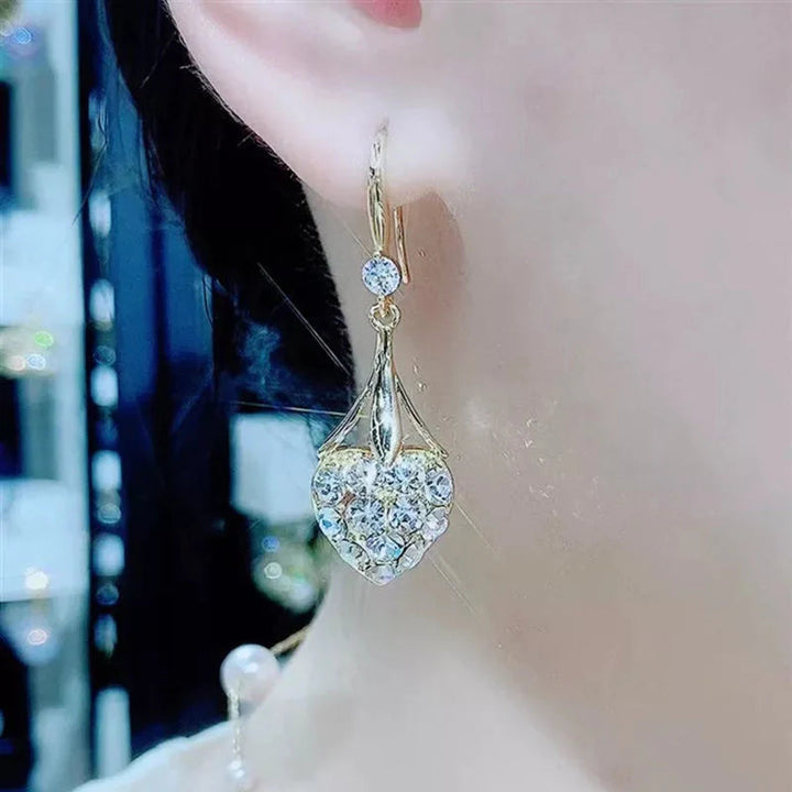 Skanto | Hjerteformede diamantøredobber