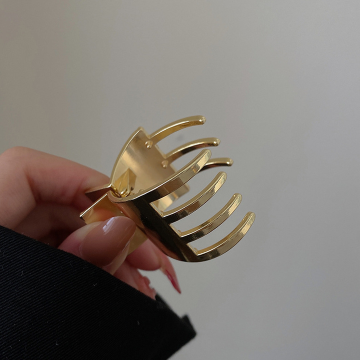 Skanto | Hodeprydnad i metall