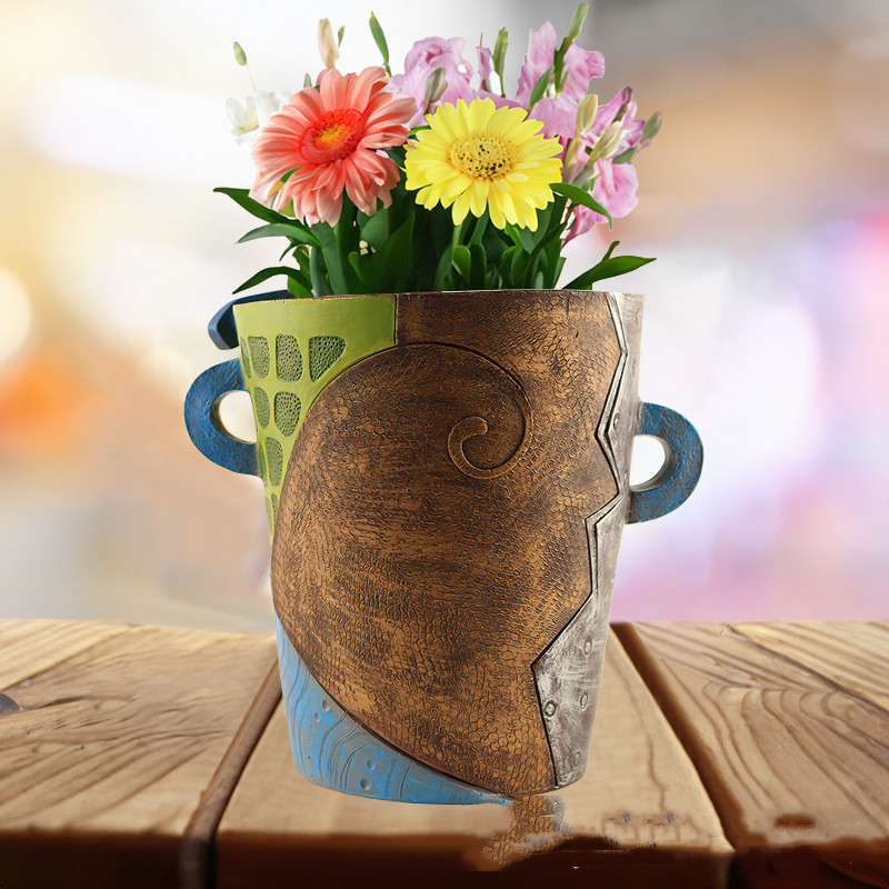 Skanto | Fargerik Ansikts Blomsterpotte – Kreativ Dekorasjon for Hjem og Hage