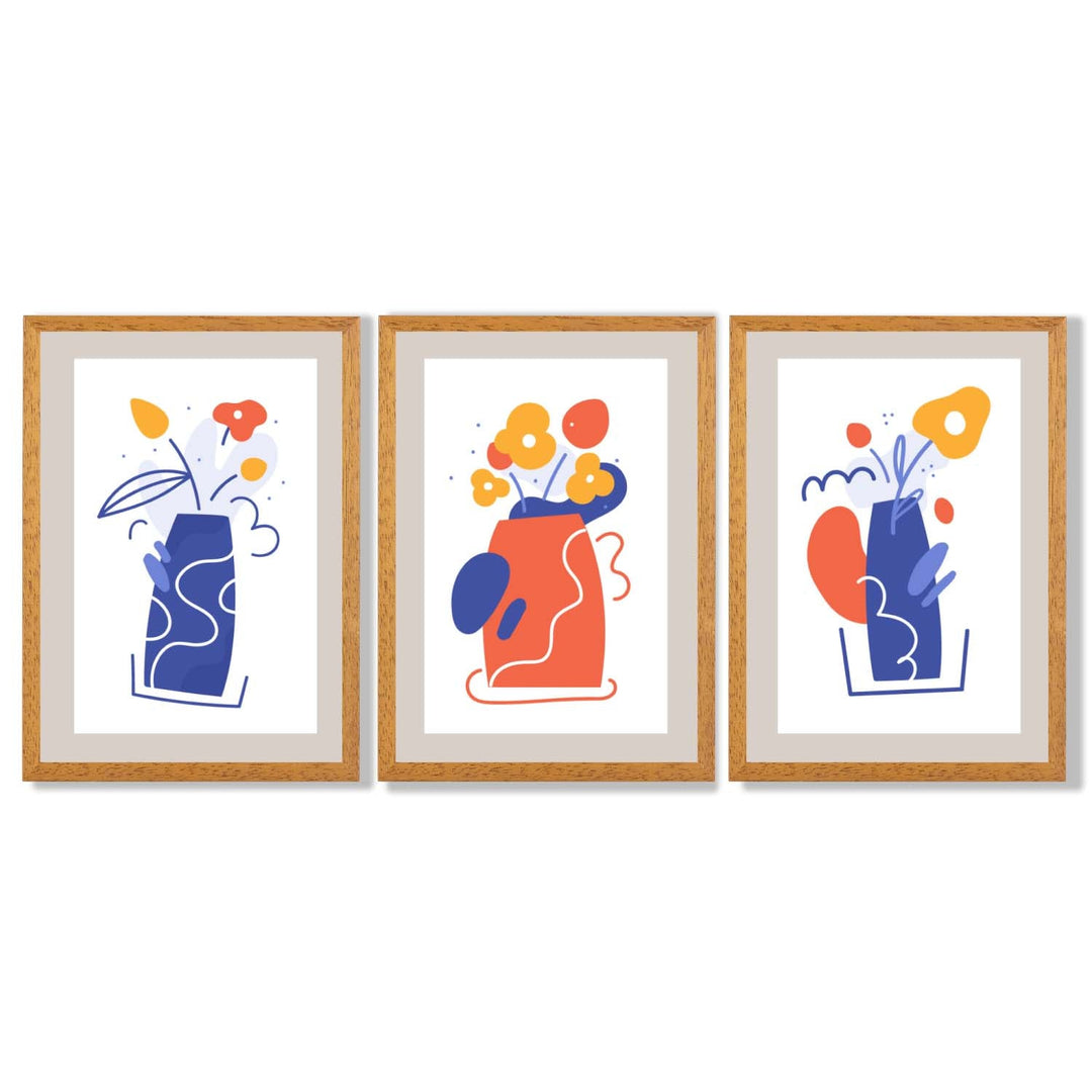 Bohemsk minimalistisk blomstertrykk i blått og oransje – sett med 3 innrammede kunsttrykk