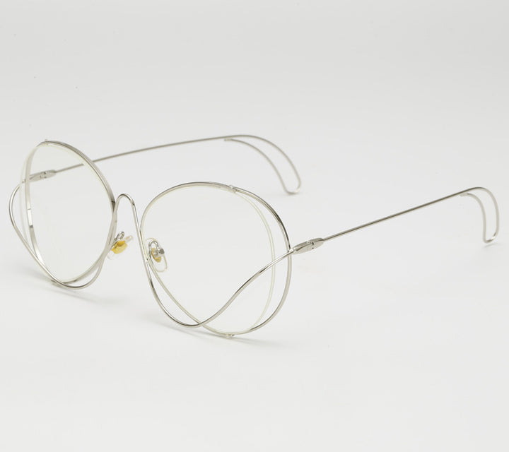Dame moteriske halvrammebriller med filigran, minimalistisk design Skanto