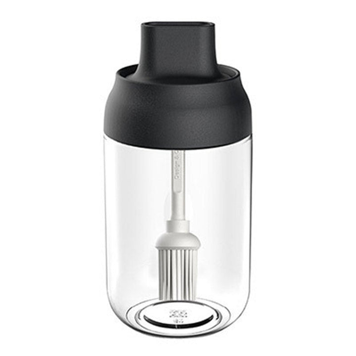 Glass condimentskrukke med skje | Skanto