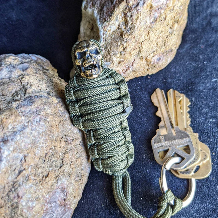 Skanto | Paracord nøkkelring mumie messing hodeskalle