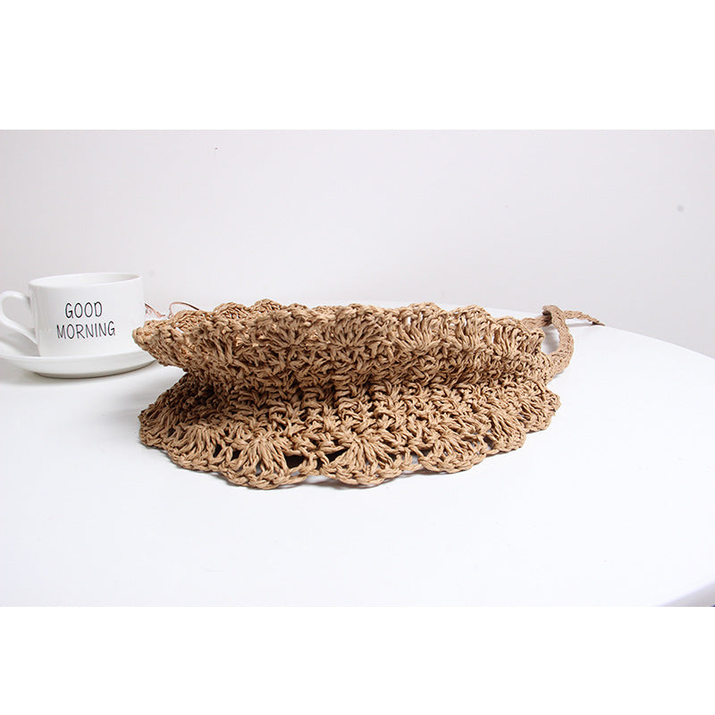Håndlaget skulderveske med gjennombrutt design Skanto