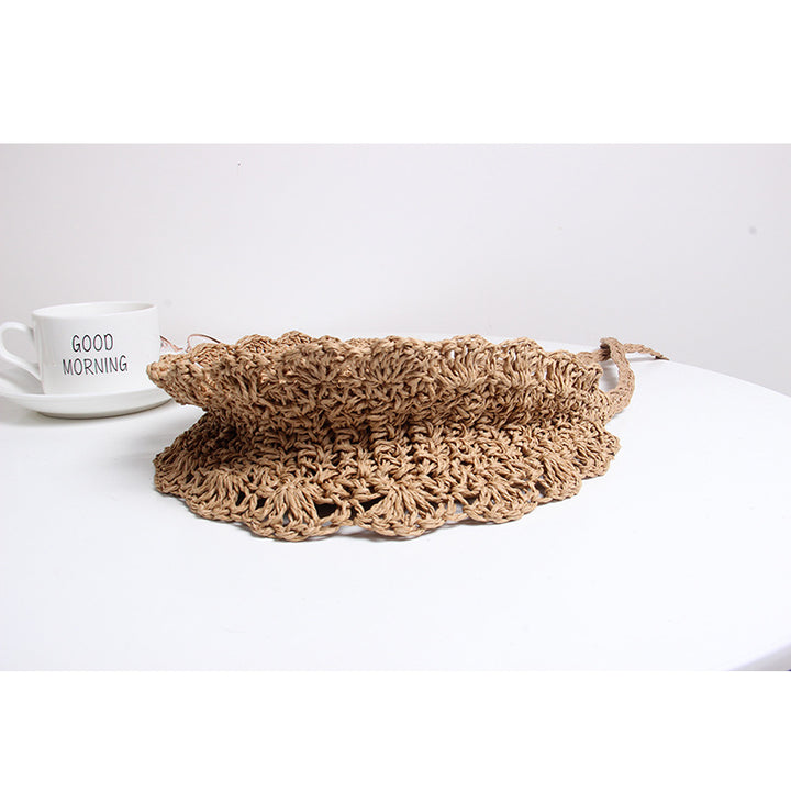 Håndlaget skulderveske med gjennombrutt design Skanto