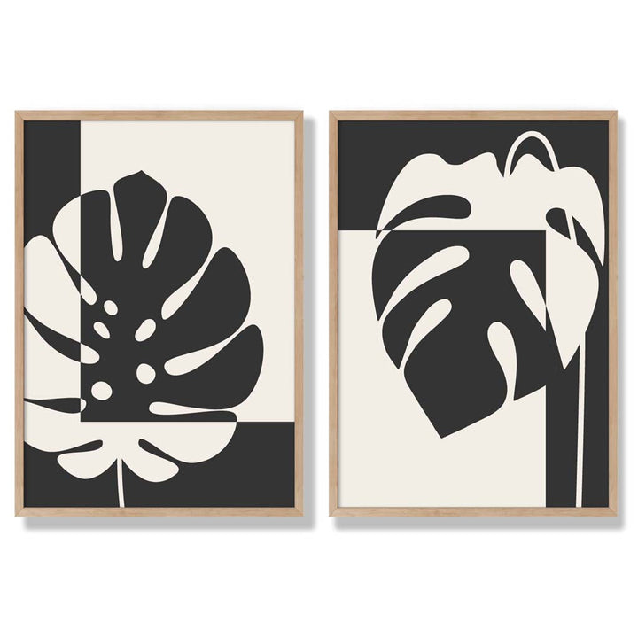 Sett med 2 innrammede kunsttrykk med Monstera-motiver i svart og beige