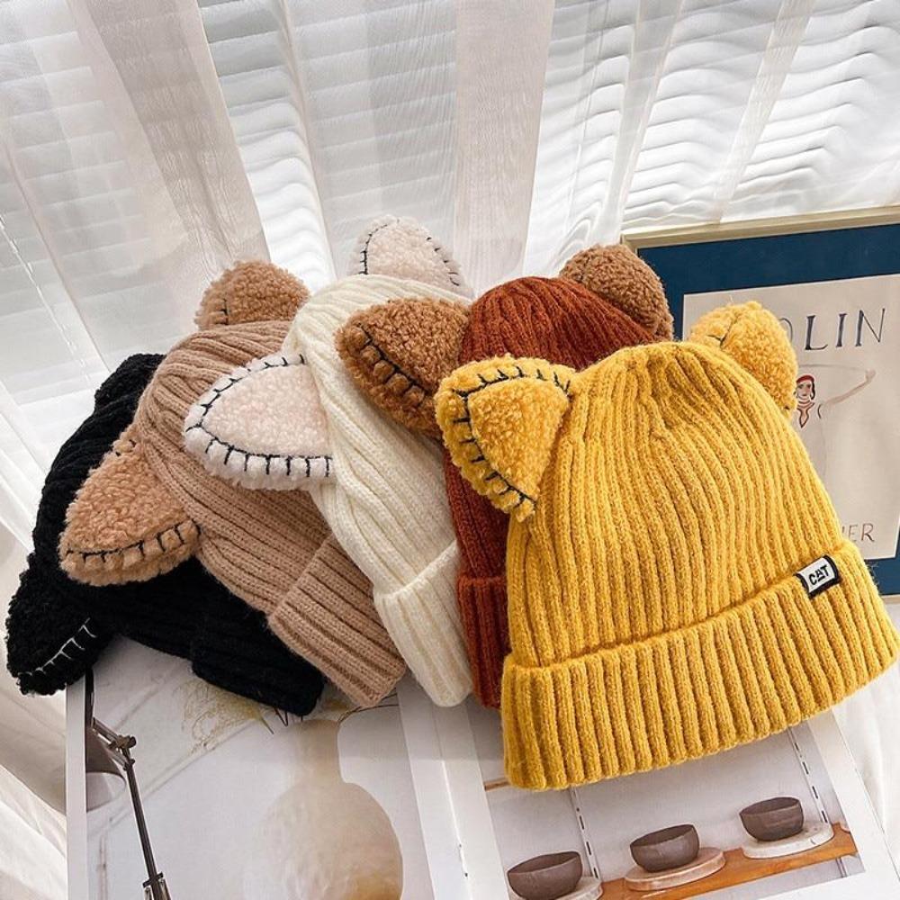 Skanto | Kattenoor Vinterlue CosyCharm – Myk strikket lue for kvinner med leken utseende