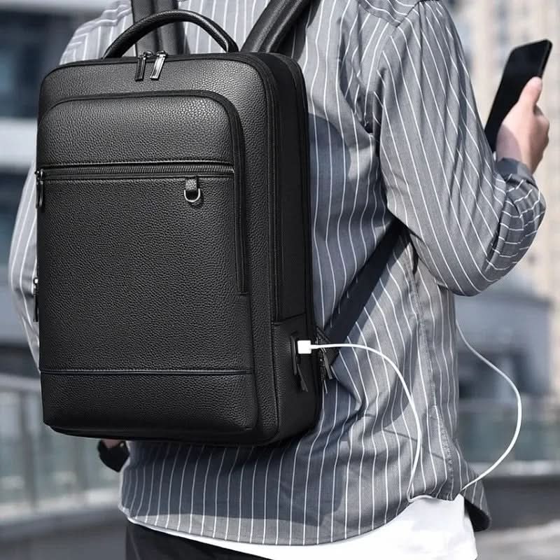 Eleganter Lederrucksack for Damen og Herren med USB-anschluss for laptop og täglichen bruk, 15,6 Zoll, schwarz