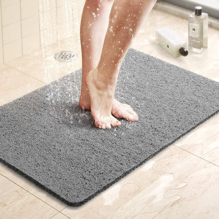 Skanto | Antiskli dusjmatte med dreneringssystem & loofah-mykt overflate