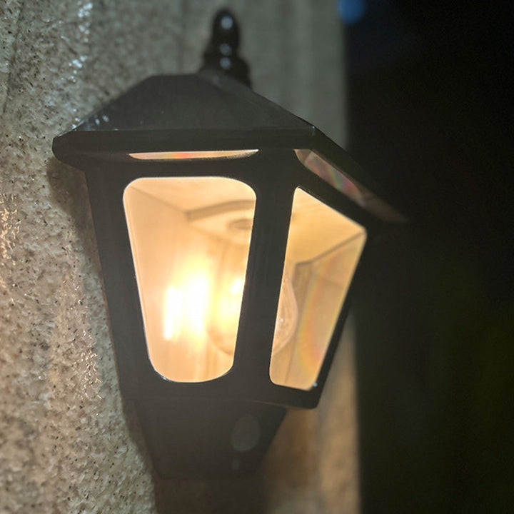 ABS Iron Fu-karakterkjegleformet solcelledrevet vegglampe med 1 lys for utendørs bruk