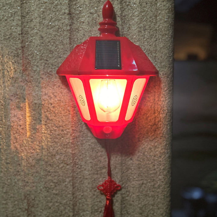 ABS Iron Fu-karakterkjegleformet solcelledrevet vegglampe med 1 lys for utendørs bruk