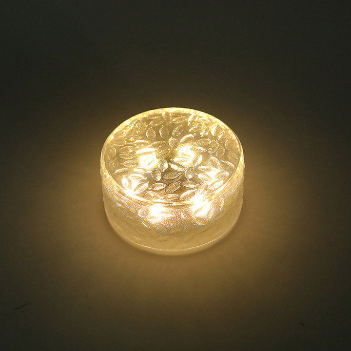 Rund LED-solcellelampe formet som en isblokk, laget av akryl for utendørs bruk