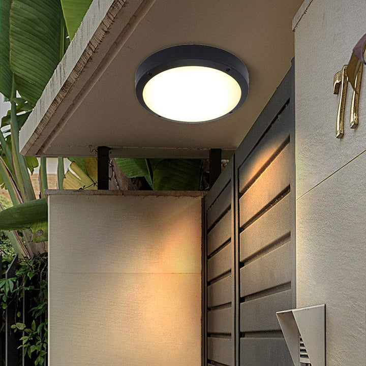 Vanntett rund LED-taklampe laget av aluminium og akryl for utendørs bruk, for innfelt montering i hagen.