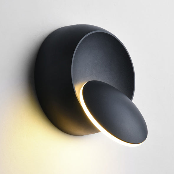 Skanto | Moderne nordisk jern rund eklips roterbar LED vegglampe for nattbord
