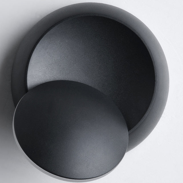 Skanto | Moderne nordisk jern rund eklips roterbar LED vegglampe for nattbord