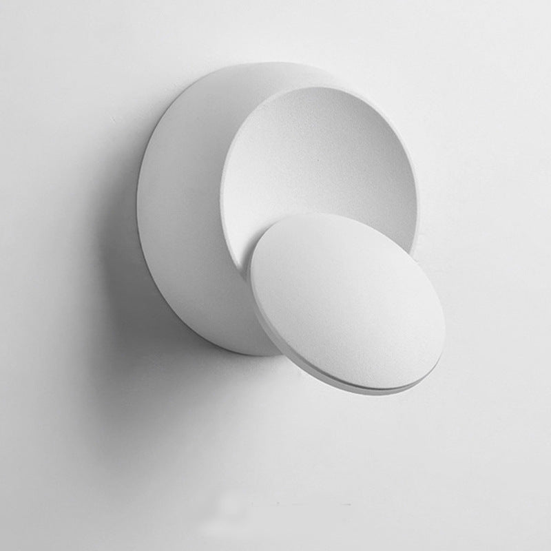 Skanto | Moderne nordisk jern rund eklips roterbar LED vegglampe for nattbord