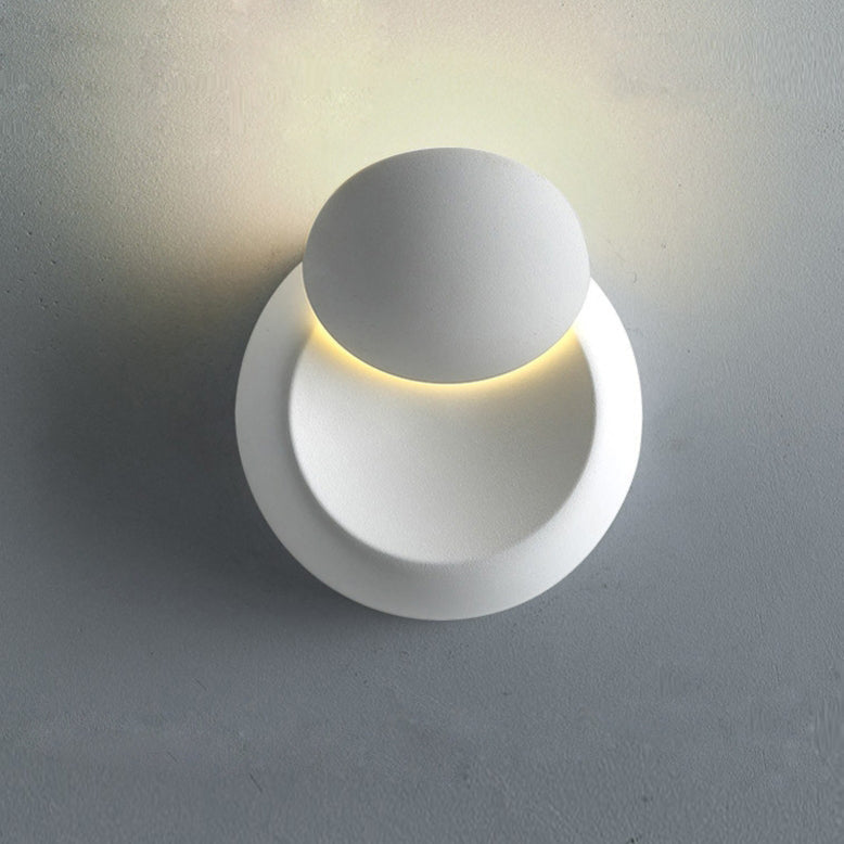Skanto | Moderne nordisk jern rund eklips roterbar LED vegglampe for nattbord