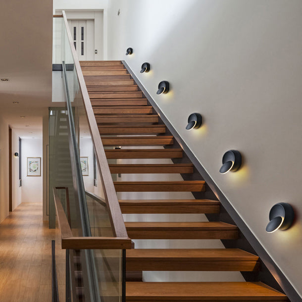 Skanto | Moderne nordisk jern rund eklips roterbar LED vegglampe for nattbord
