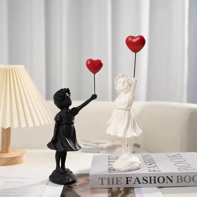 Skanto | Banksy flygende ballongjente statue