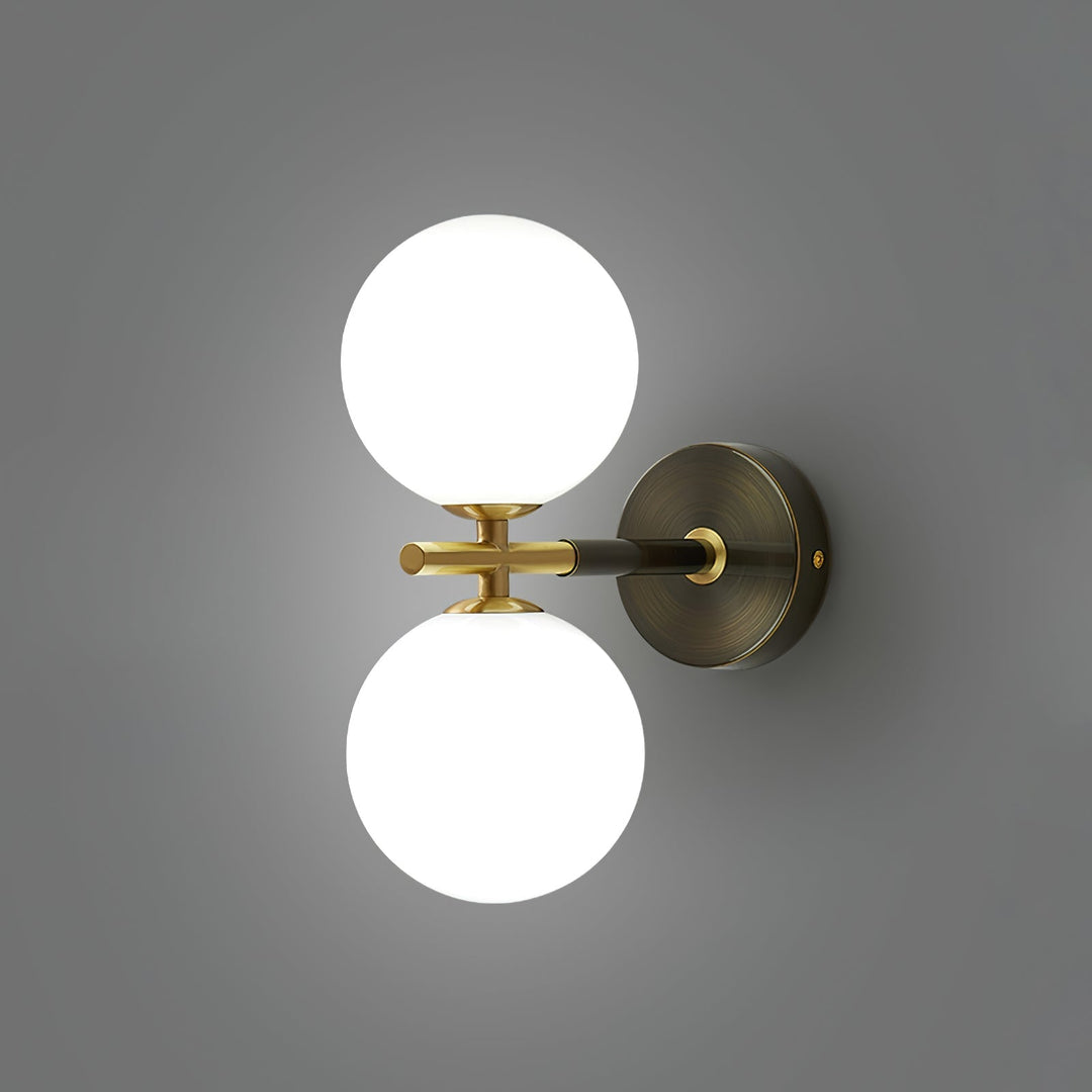 Skanto | GlobalGlow – Gullvegglampe med global inspirasjon