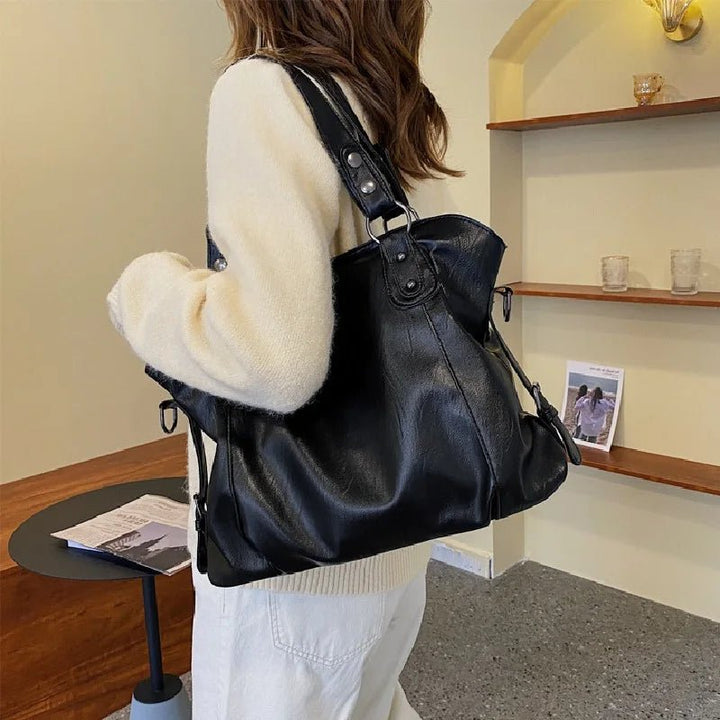Skanto | Damens totebag med myk faux skinn følelse og praktiske flere rom