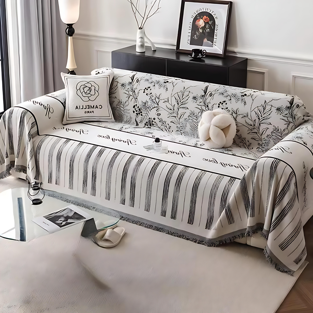 Skanto | Elegant svart og hvitt sofa dekke beskytter
