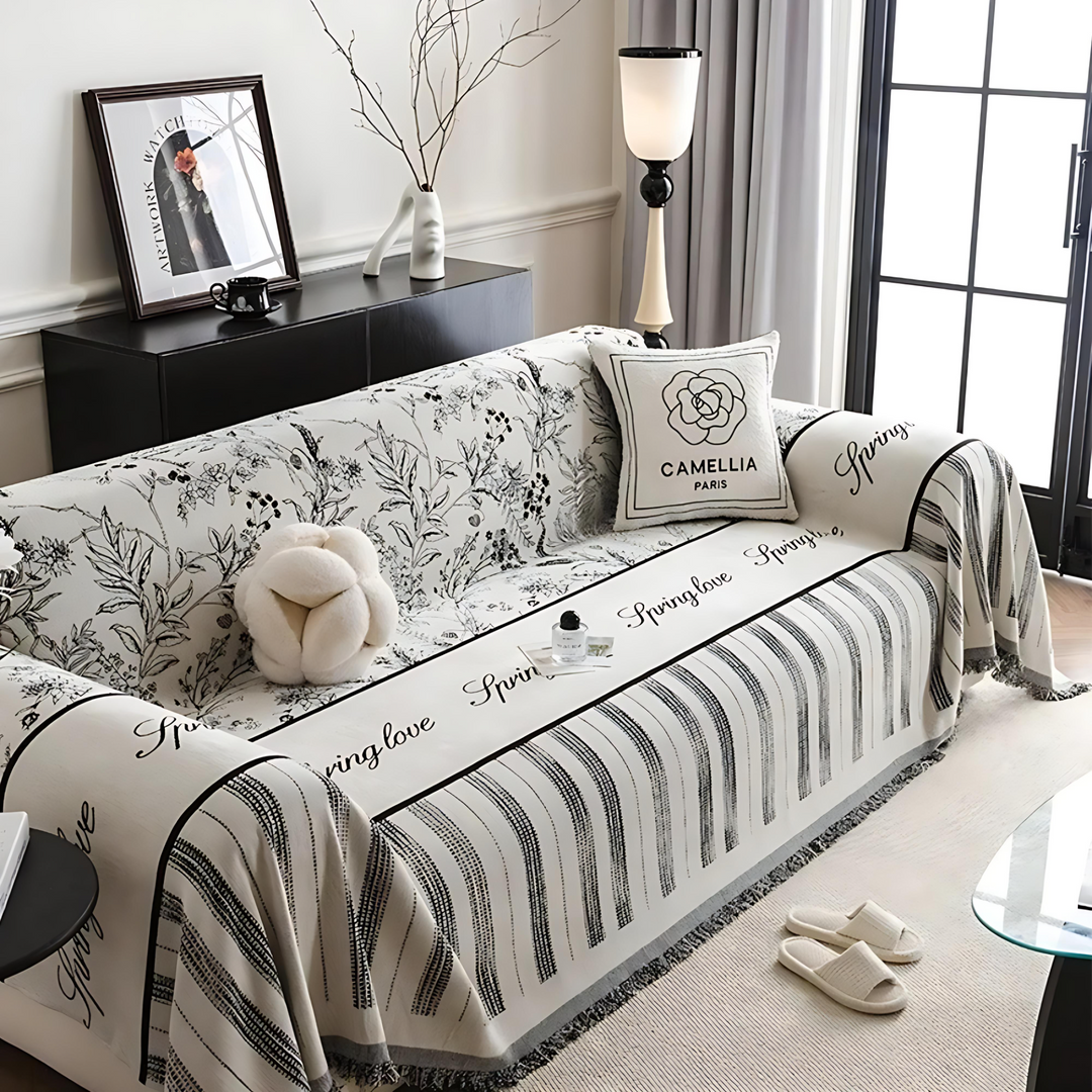 Skanto | Elegant svart og hvitt sofa dekke beskytter