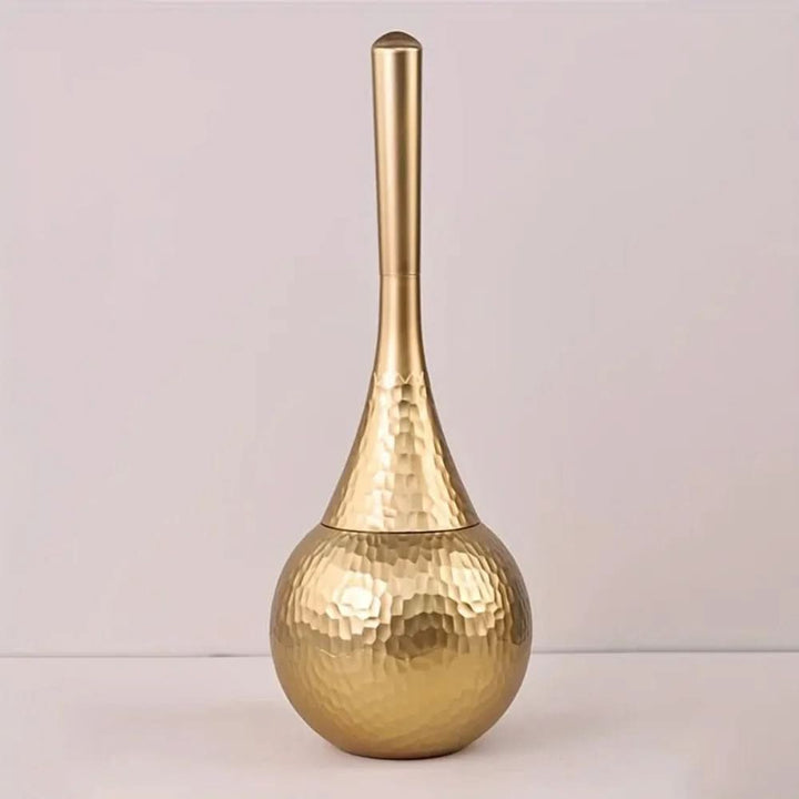 Elegante toalettbürste i moderne Golddesign for stil og hygiene