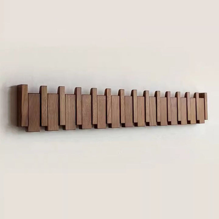 Tre vegghenger i piano design med sammenleggbare kroker | Skanto
