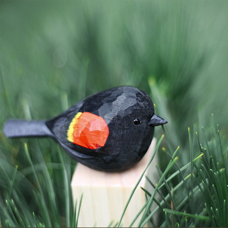 Skanto | NordicFeathers - Elegante Treskulpturer av Fugler