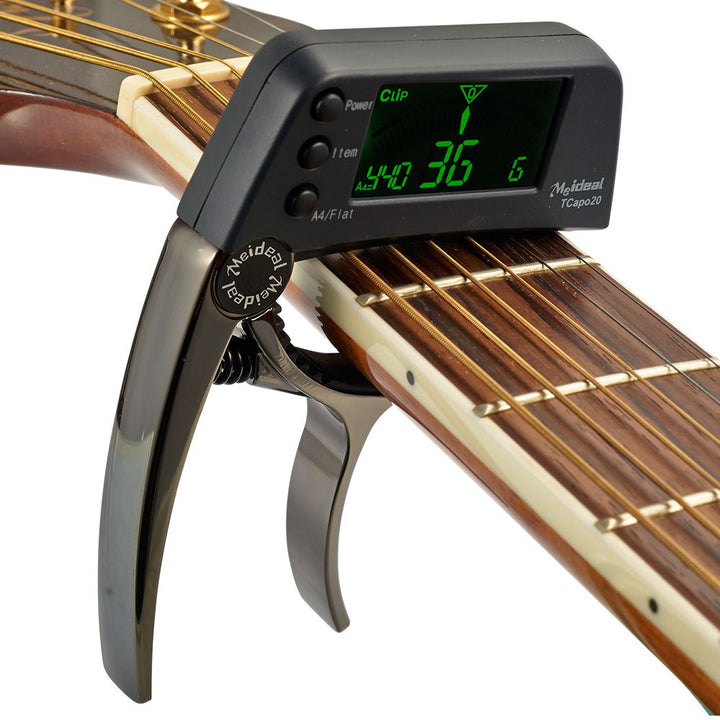 Capo & Stimmgerät „TuneGrip“ – 2-i-1 Gitarrenzubehör med LCD-bildeskjerm